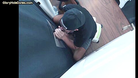 Senior gloryhole amateur gay blows BFs dick through hole