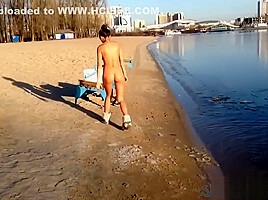 Sexy Russian Babe Strips and runs into Icy River