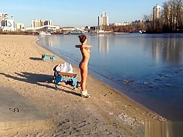 Sexy Russian Babe Strips and runs into Icy River