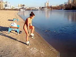 Sexy Russian Babe Strips and runs into Icy River