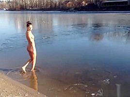Sexy Russian Babe Strips and runs into Icy River