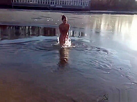 Sexy Russian Babe Strips and runs into Icy River
