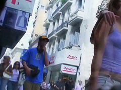 Sexy brunette with nice tits, a nicer ass on a sidewalk candid vid
