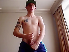 Sexy guy jerks it