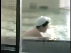 Smiling and talking Asian dolls showering hot bodies