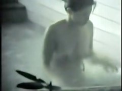 Smiling and talking Asian dolls showering hot bodies