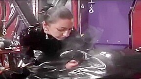 Smoking fetish latex gloved mistress