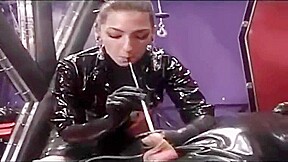 Smoking fetish latex gloved mistress