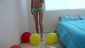 Sophie Plays With Yellow Balloon - SoloAustria