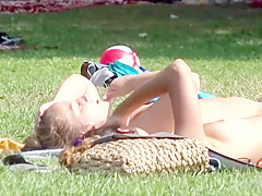 Stunning young piece of ass gets filmed while sunbathing to