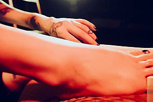 Teasin with my tootsies: crossdress footjob from tattooed goth girl