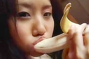 Titless Asian teen 18+ plays with a banana
