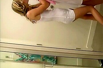 Two girl girlfriends in a changing room