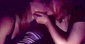 Two girlfriends give a public double blowjob in a movie thea
