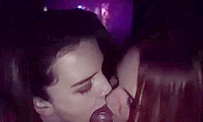 Two girlfriends give a public double blowjob in a movie thea