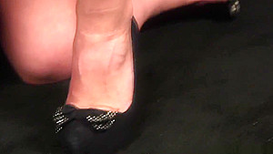 Uniformed domina handjob