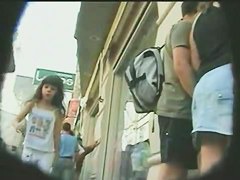 Upskirt loving sneaks up next to the unsuspecting girls