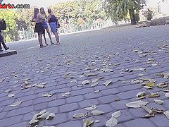 Upskirting vid of an auburn-hair gal in a public place