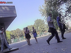 Upskirting vid of an auburn-hair gal in a public place