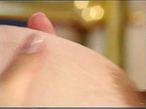 Vintage clip shows prego MILF playing with boobs