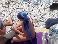 Woman blows her man's cock in the water