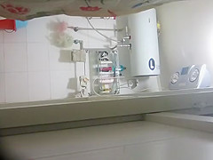 Woman undressing to wash her tight body