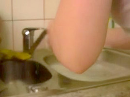 Young german blonde fucked during washing-up