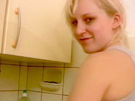 Young german blonde fucked during washing-up