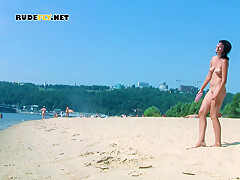 Young nudists is tantalizing and making the girls around her jealous