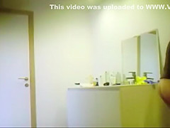 cums on an unaware woman