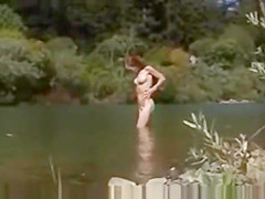 natural redhead getting off by river style micro mini bikini