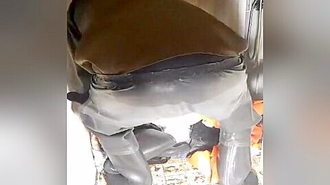 nlboots - rubber waders, rubber shorts and military shirt
