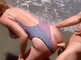 sally layd on the beach