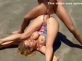 sally layd on the beach