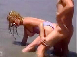 sally layd on the beach