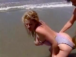 sally layd on the beach