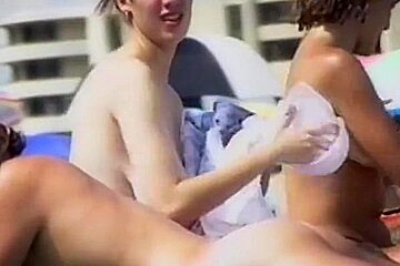 shy girl with big tits on French beach