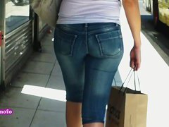 slightly chubby street candid bit of ass in a rush chewing big time