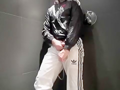 twink pissing in his Adidas tracksuit