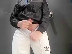 twink pissing in his Adidas tracksuit
