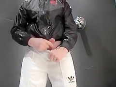twink pissing in his Adidas tracksuit