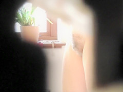 with saggy melons gets spied on during a bath